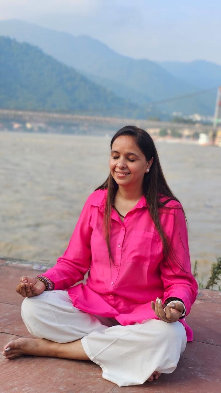 Simraen Kour in meditation on the banks of the Ganga at Rishikesh